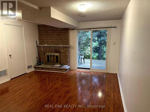 2 - 25 Cardwell Avenue, Toronto, ON - Indoor With Fireplace