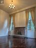 2 - 25 Cardwell Avenue, Toronto, ON  - Indoor Photo Showing Living Room With Fireplace 