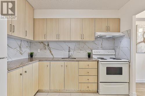 2004 - 4091 Sheppard Avenue E, Toronto, ON - Indoor Photo Showing Kitchen