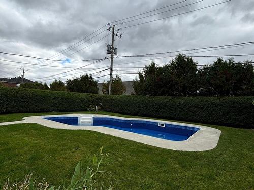 Pool - 4-556 Rue De Bristol, Saint-Jean-Sur-Richelieu, QC - Outdoor With In Ground Pool With Backyard