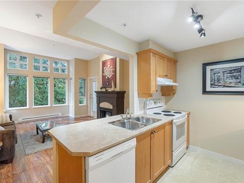 303-5660 Edgewater Lane, Nanaimo, BC - Indoor Photo Showing Kitchen With Double Sink