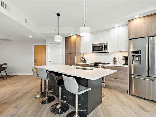 410-950 Whirlaway Cres, Langford, BC - Indoor Photo Showing Kitchen With Stainless Steel Kitchen With Double Sink With Upgraded Kitchen