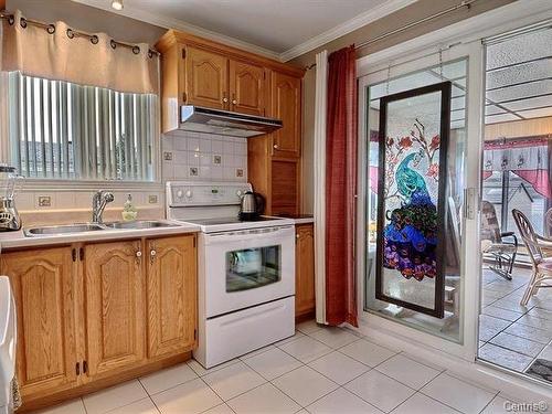 Cuisine - 294 Rue De La Lyre, L'Épiphanie, QC - Indoor Photo Showing Kitchen With Double Sink