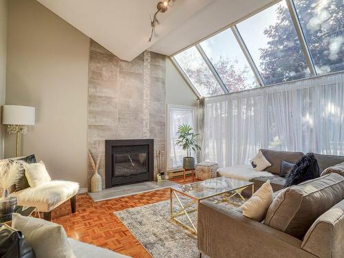 Salon - 1133 Rue Noiseux, Repentigny (Repentigny), QC - Indoor Photo Showing Living Room With Fireplace