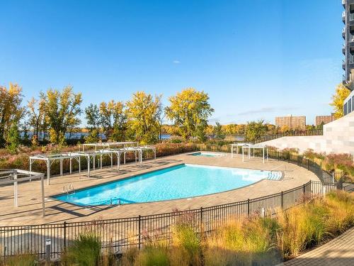 Pool - 410-100 Rue André-Prévost, Montréal (Verdun/Île-Des-Soeurs), QC - Outdoor With In Ground Pool With Backyard