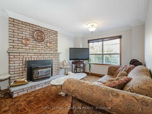 100 Gas Light Cres, Vaughan, ON - Indoor Photo Showing Living Room With Fireplace