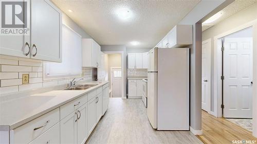 1051 Cameron Street, Regina, SK - Indoor Photo Showing Kitchen With Double Sink