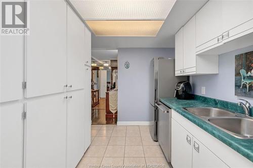 5125 Riverside Drive East Unit# 202, Windsor, ON - Indoor Photo Showing Kitchen With Double Sink