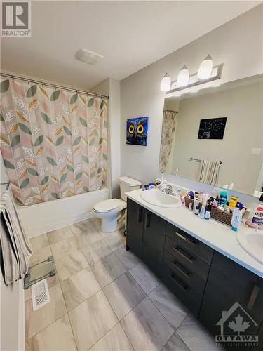 Primary ensuite with double sink vanity - 670 Jerome Jodoin Drive, Ottawa, ON - Indoor Photo Showing Bathroom