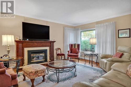 1365 Dobbin Avenue, Peterborough (Monaghan), ON - Indoor Photo Showing Living Room With Fireplace