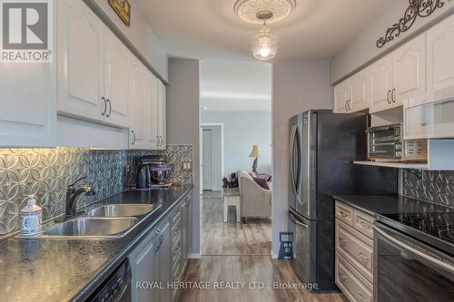 216A - 1099 Clonsilla Avenue, Peterborough, ON - Indoor Photo Showing Kitchen With Double Sink