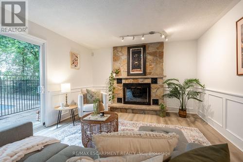 33 Cumminsville Drive, Hamilton, ON - Indoor Photo Showing Living Room With Fireplace