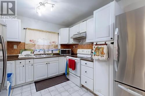 7 - 61 Driftwood Avenue, Toronto, ON - Indoor Photo Showing Kitchen With Double Sink