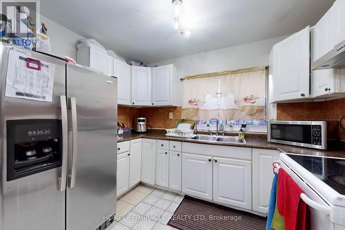 7 - 61 Driftwood Avenue, Toronto, ON - Indoor Photo Showing Kitchen With Double Sink