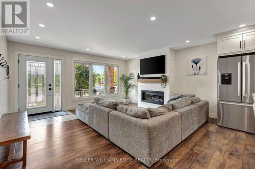 23 Regis Court, Hamilton, ON - Indoor Photo Showing Living Room With Fireplace