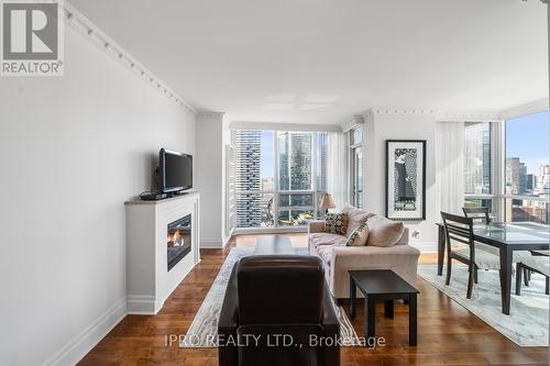 3402 - 16 Harbour Street, Toronto, ON - Indoor Photo Showing Living Room With Fireplace