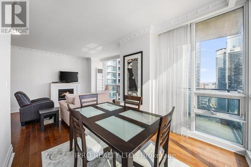 3402 - 16 Harbour Street, Toronto, ON - Indoor Photo Showing Dining Room With Fireplace