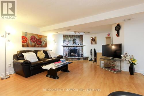 25 Finchley Crescent, Brampton, ON - Indoor Photo Showing Living Room With Fireplace