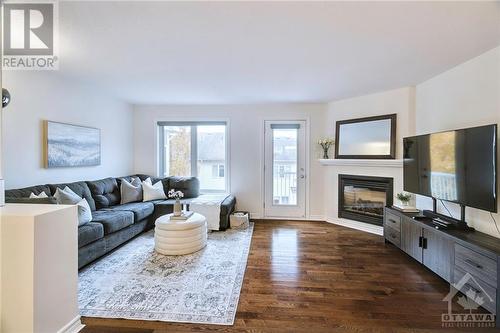 205 Marrissa Avenue, Ottawa, ON - Indoor Photo Showing Living Room With Fireplace