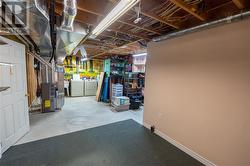 Large storage area with laundry room. - 