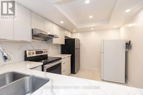 1613 - 330 Alton Towers Circle, Toronto, ON - Indoor Photo Showing Kitchen With Double Sink