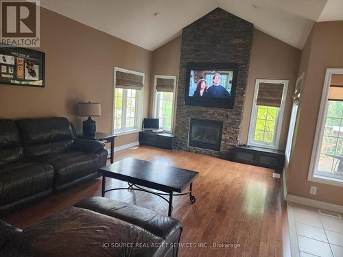 Main Fl - 6 Basswood Drive, Wasaga Beach, ON - Indoor Photo Showing Living Room With Fireplace