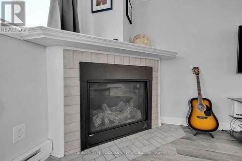 103 - 5 Jacksway Crescent, London, ON - Indoor Photo Showing Living Room With Fireplace