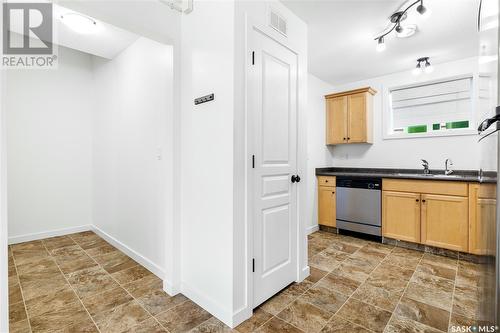 42 4640 Harbour Landing Drive, Regina, SK - Indoor Photo Showing Kitchen With Double Sink