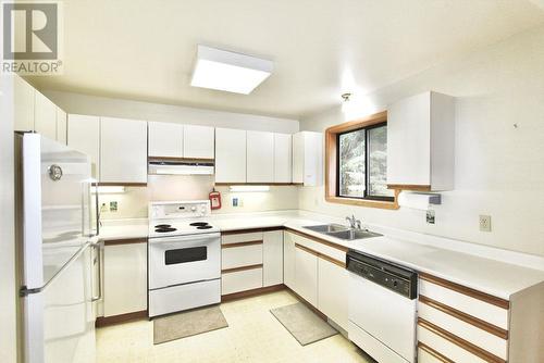 2092 Teal Boulevard, Masset, BC - Indoor Photo Showing Kitchen With Double Sink