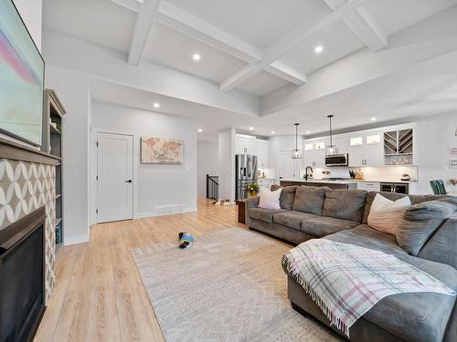 215-641 Shuswap Road E, Kamloops, BC - Indoor Photo Showing Living Room With Fireplace