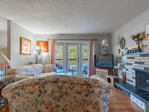 435 Schubert Drive, Kamloops, BC - Indoor Photo Showing Bedroom With Fireplace