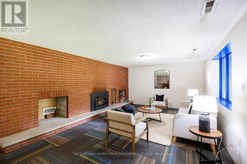 3310 County Road 121, Galway-Cavendish And Harvey, ON - Indoor Photo Showing Living Room With Fireplace