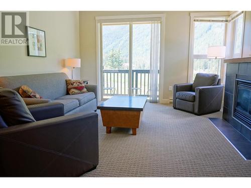 2049 Summit Drive Unit# 314B, Panorama, BC - Indoor Photo Showing Living Room With Fireplace