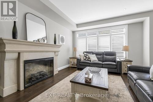 16 - 270 Main Street W, Grimsby, ON - Indoor Photo Showing Living Room With Fireplace