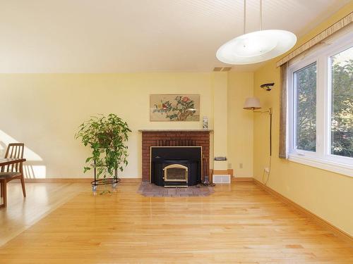 Salon - 725 45E Avenue, Montréal (Lachine), QC - Indoor Photo Showing Living Room With Fireplace