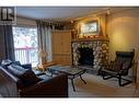 2030 Panorama Drive Unit# 1007, Panorama, BC  - Indoor Photo Showing Living Room With Fireplace 