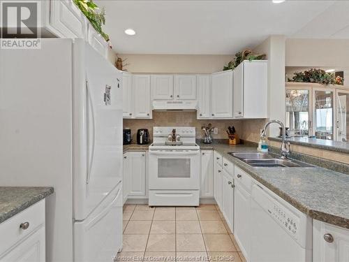 325 Village Grove Unit# 506, Tecumseh, ON - Indoor Photo Showing Kitchen With Double Sink