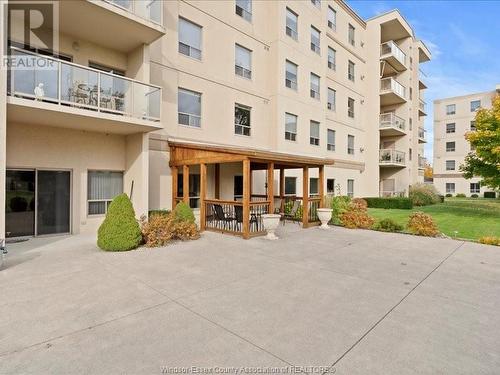 325 Village Grove Unit# 506, Tecumseh, ON - Outdoor With Balcony With Facade