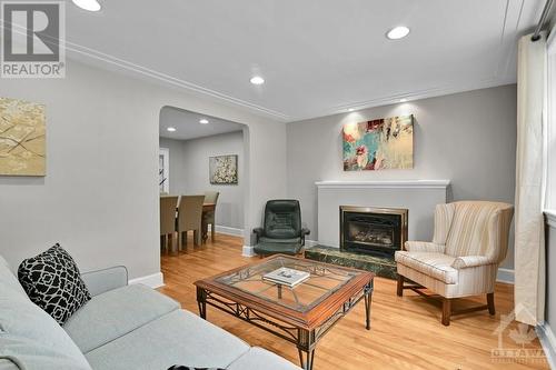 Main floor - Living room w fireplace - 53 Bullock Avenue, Ottawa, ON - Indoor Photo Showing Living Room With Fireplace