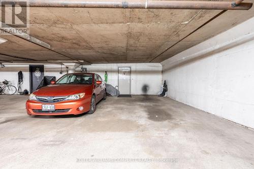 64 - 5475 Lakeshore Road, Burlington, ON - Indoor Photo Showing Garage