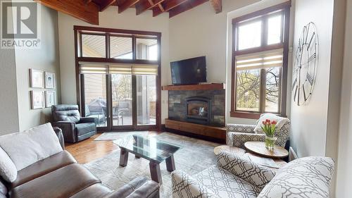 901 2Nd  Avenue Unit# 103B, Fernie, BC - Indoor Photo Showing Living Room With Fireplace