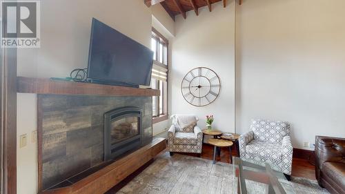 901 2Nd  Avenue Unit# 103B, Fernie, BC - Indoor Photo Showing Living Room With Fireplace