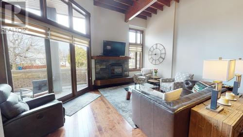 901 2Nd  Avenue Unit# 103B, Fernie, BC - Indoor Photo Showing Living Room With Fireplace