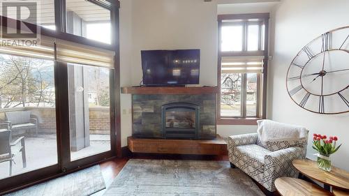 901 2Nd  Avenue Unit# 103B, Fernie, BC - Indoor Photo Showing Living Room With Fireplace