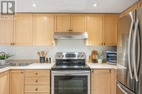 #105 - 50 Merchant Lane, Toronto, ON - Indoor Photo Showing Kitchen