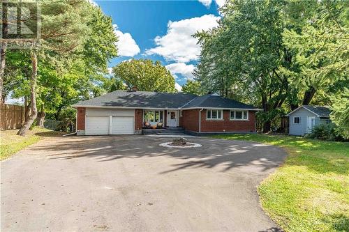 Entire Driveway repaved with Interlock & new foundation on front porch - 2023 (Parking for 12 cars!) - 3027 Prince Of Wales Drive, Ottawa, ON - Outdoor