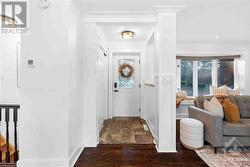 Foyer with front closet & Bay Windows in Living Room with Window Seating - 