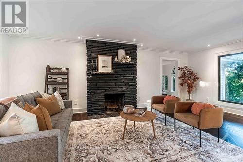 3027 Prince Of Wales Drive, Ottawa, ON - Indoor Photo Showing Living Room With Fireplace