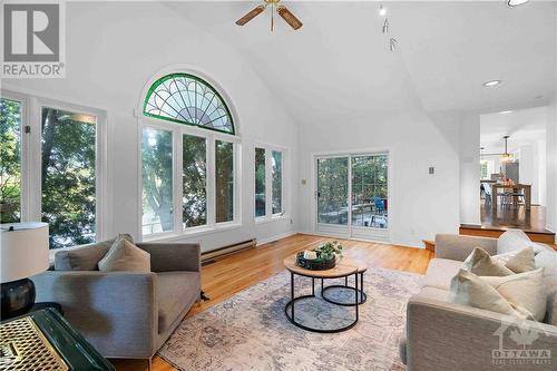 Sunken Family Room with Ample Windows & Patio Doors - 3027 Prince Of Wales Drive, Ottawa, ON - Indoor Photo Showing Living Room