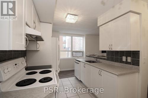 404 - 4 Elsinore Path, Toronto, ON - Indoor Photo Showing Kitchen